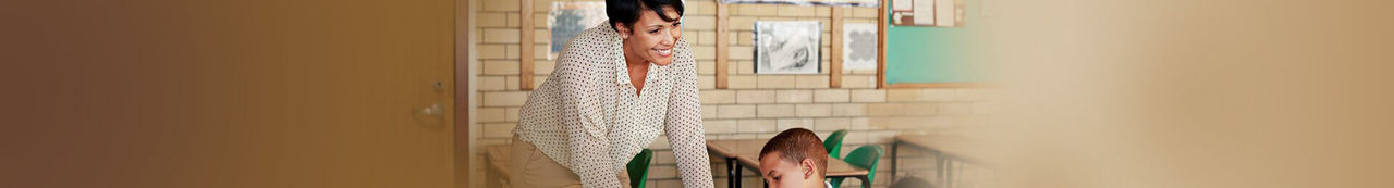 Teacher and student in classroom